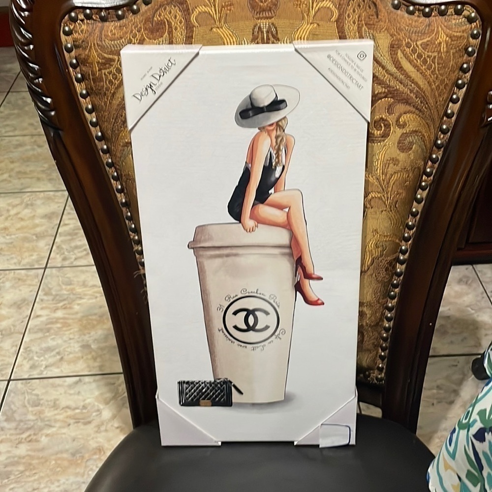 New a designer district studios Parisian Girl sitting on top of a coffee